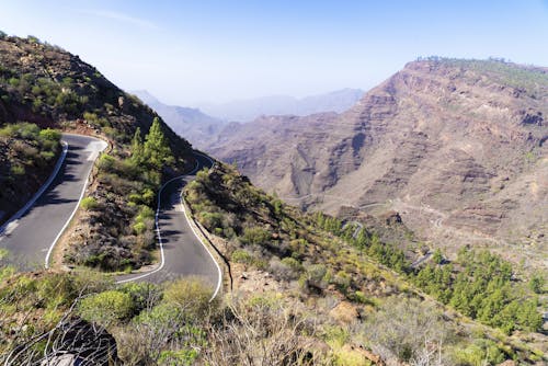 Asphalt curvy road in mountainous valley
