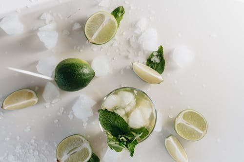 Free Top View Photo Of Lime Beside Glass Stock Photo