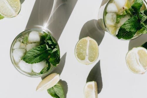 Close-Up Photo Of Mint Leaves On Glass