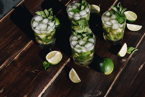 Photo Of Mojito's On Wooden Surface
