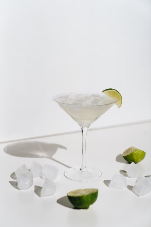 Free A classic margarita cocktail served in a chilled glass with lime and ice cubes. Stock Photo