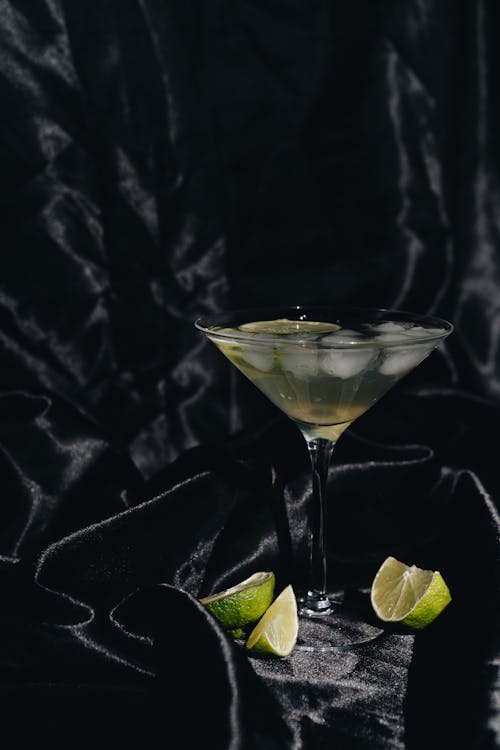 Photo Of Cocktail Glass On Silk Fabric