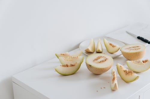 Photo Of Sliced Melon On Plate