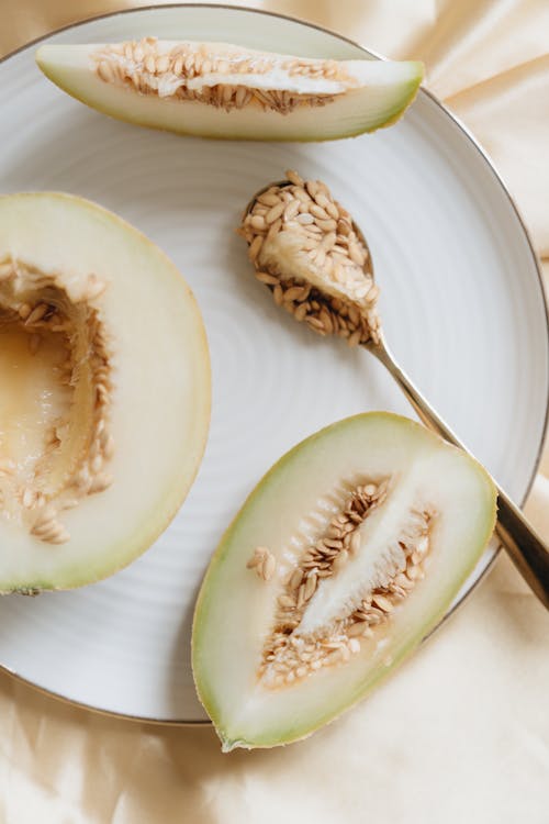 Photo Of Spoon With Melon Seeds