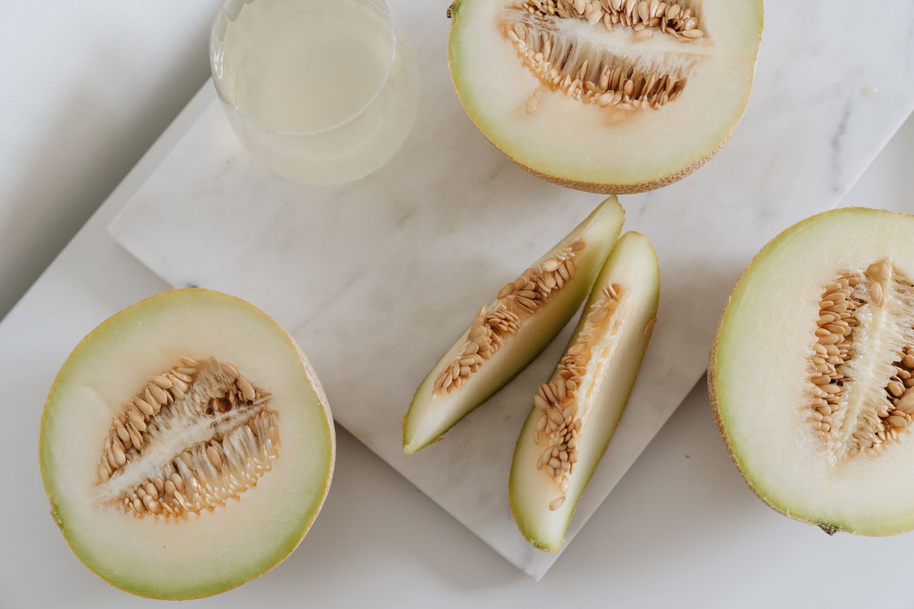 Fresh Galia melon sliced and ready to serve on a plate
