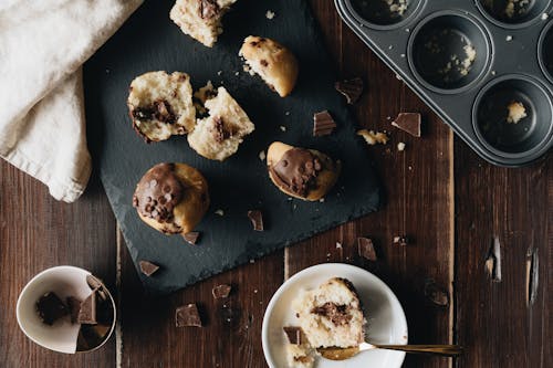 Photo Of Chocolate Muffins On Stone Board