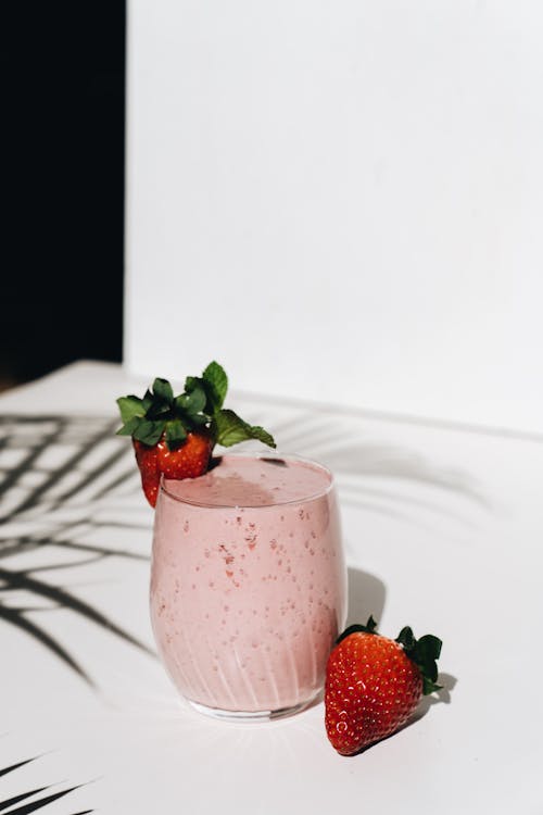 Free Strawberry Smoothie on White Table Stock Photo