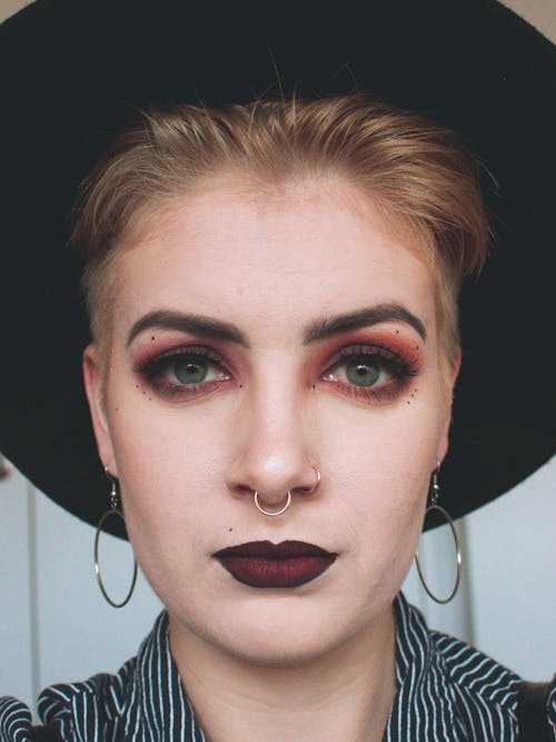 Photo Of Woman Wearing Black Hat