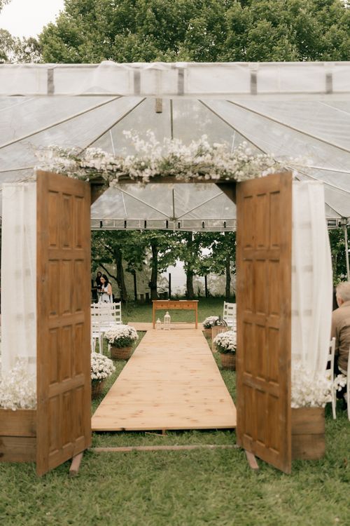 Rustic Outside Background Rustic Outdoor Wedding Aisle with Wooden Doors · Free Stock Photo