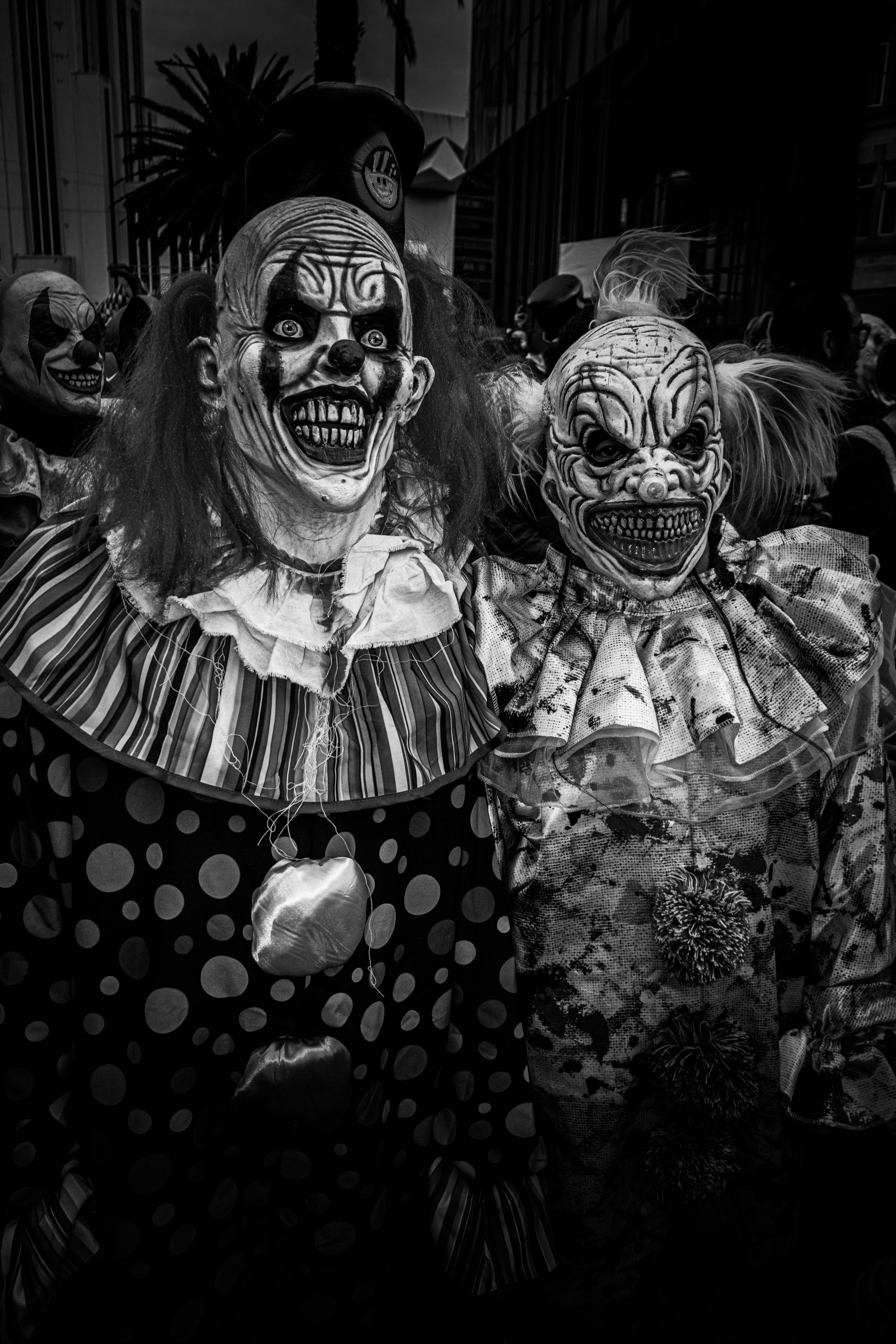 Creepy Clown Parade in Black and White · Free Stock Photo
