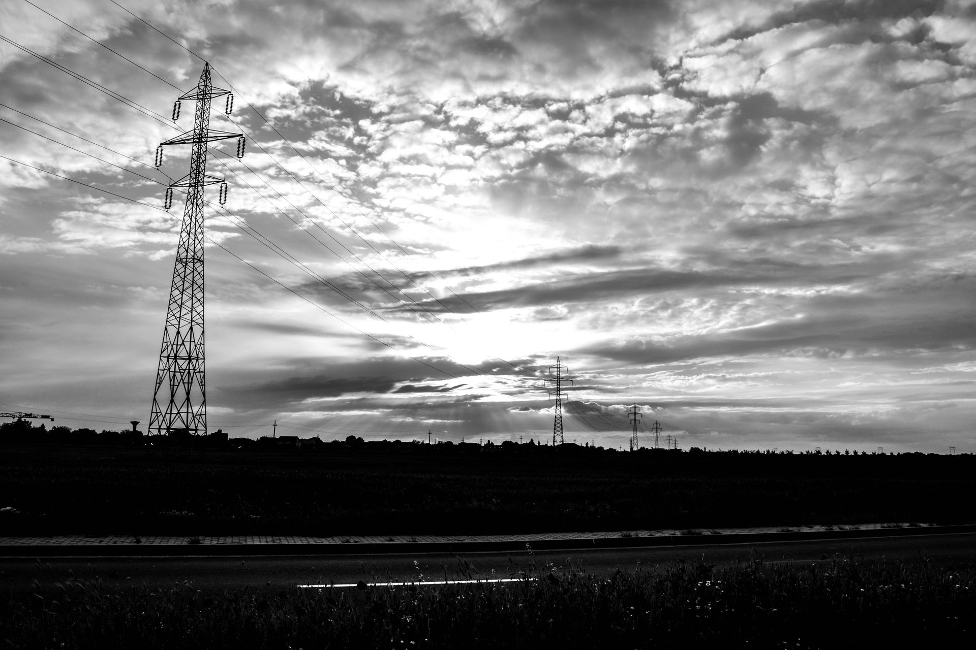 Grayscale Photography of Transmission Towers