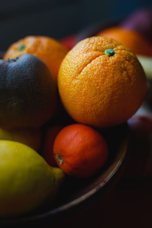 Free Close-up of mixed citrus fruits in a bowl, showcasing freshness and vibrant colors. Stock Photo