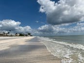 White Clouds over the Beach