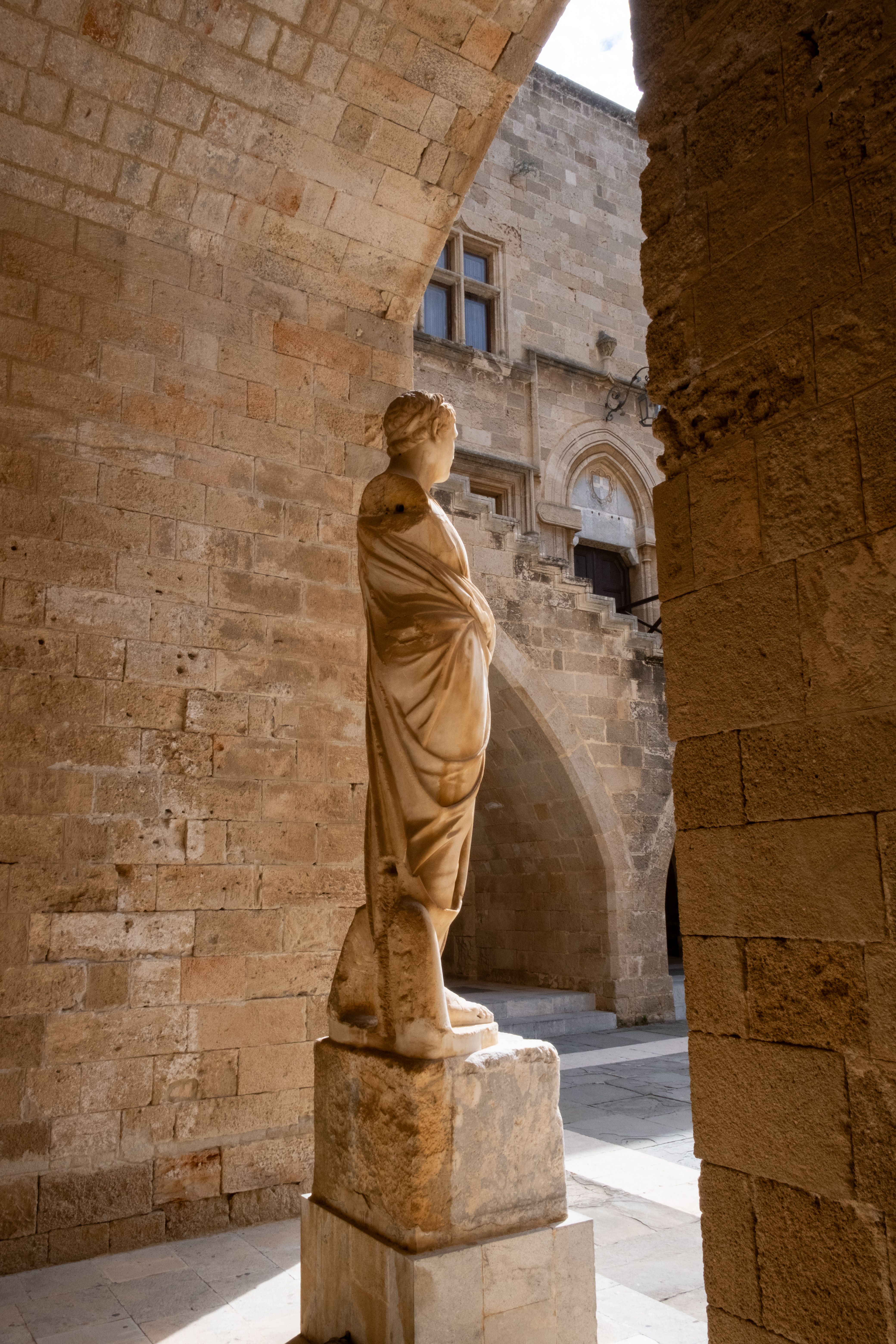 Ancient Statue in Medieval Rodos Architecture · Free Stock Photo