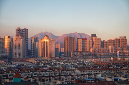 Photo Of City During Dawn