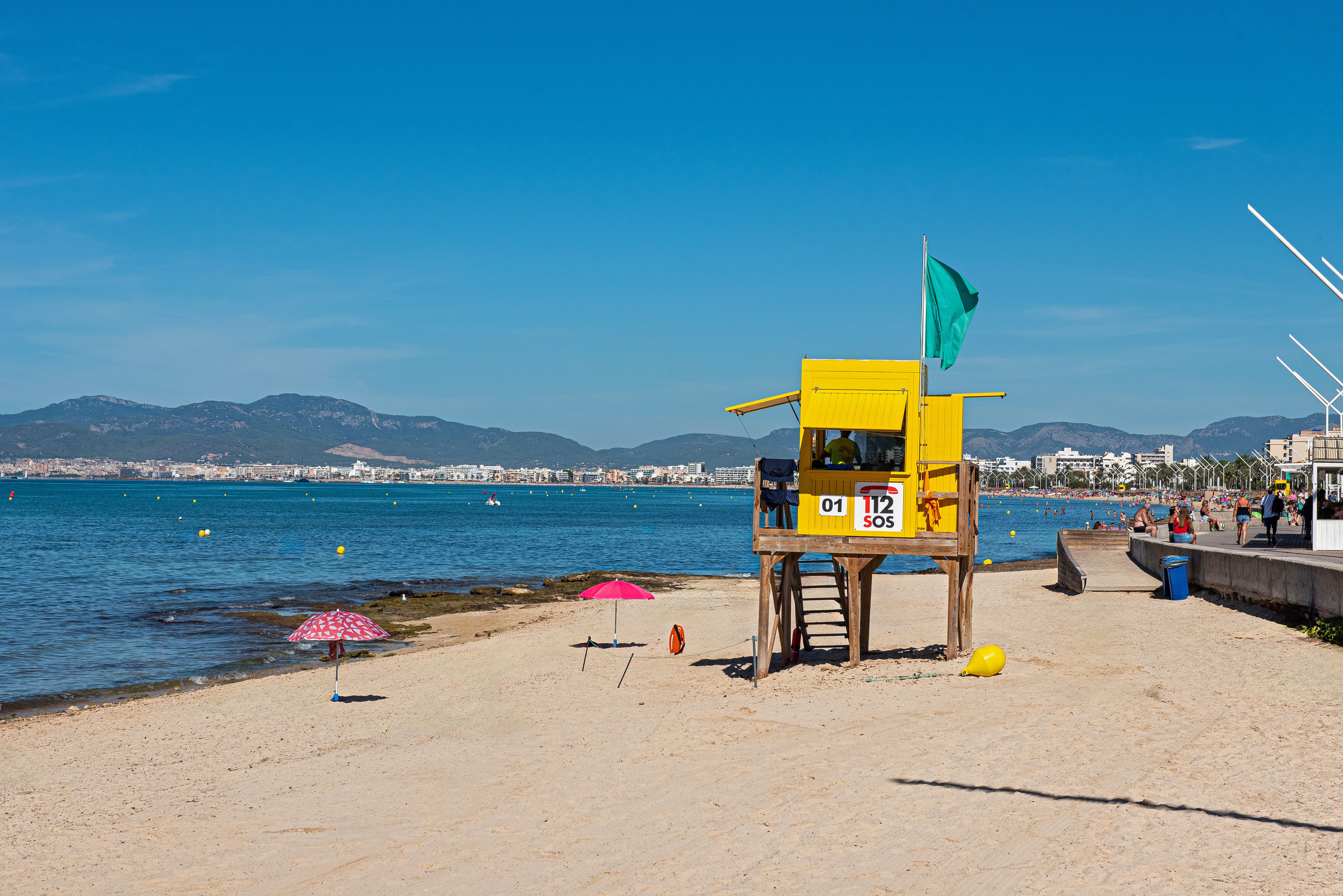 Sunny Day at Playa de Palma Beach with Lifeguard Tower · Free Stock Photo