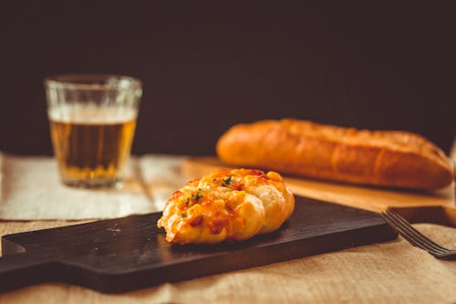Free Photo Of Bread On Top Of Wooden Tray Stock Photo