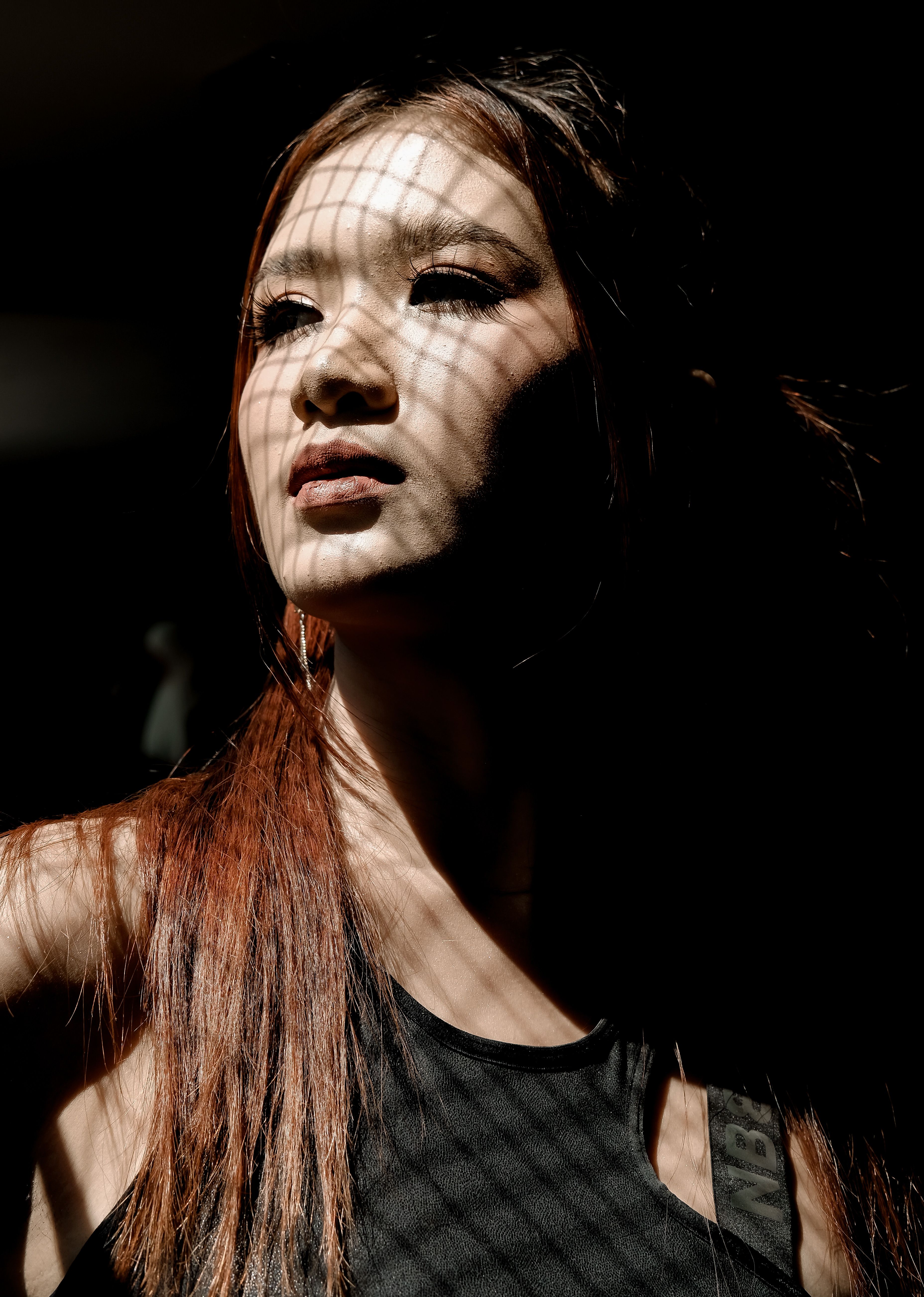 Dramatic Portrait with Shadow Patterns · Free Stock Photo