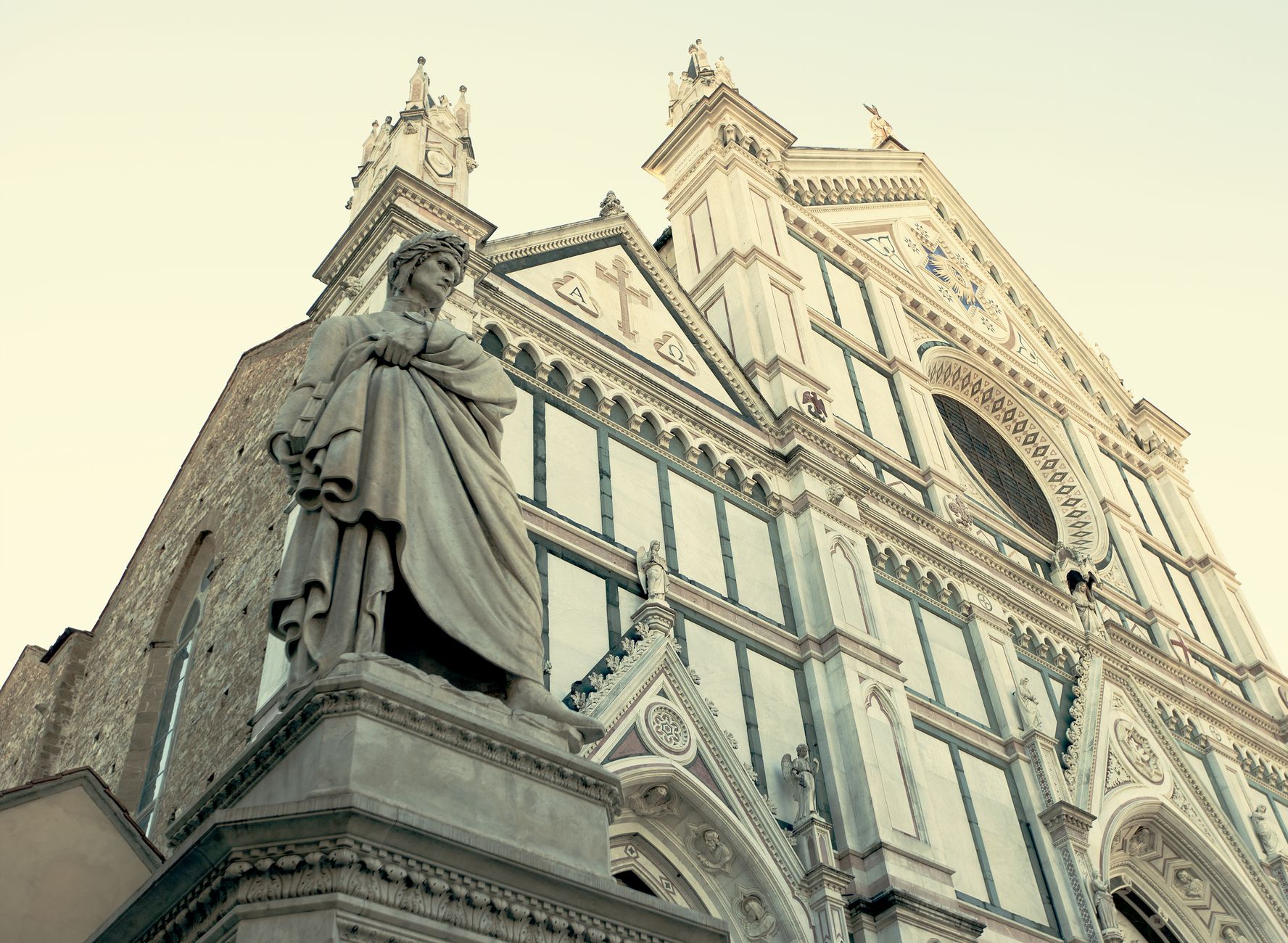 Basilica of Santa Croce facade in Florence, Italy — the neo-Gothic white marble front