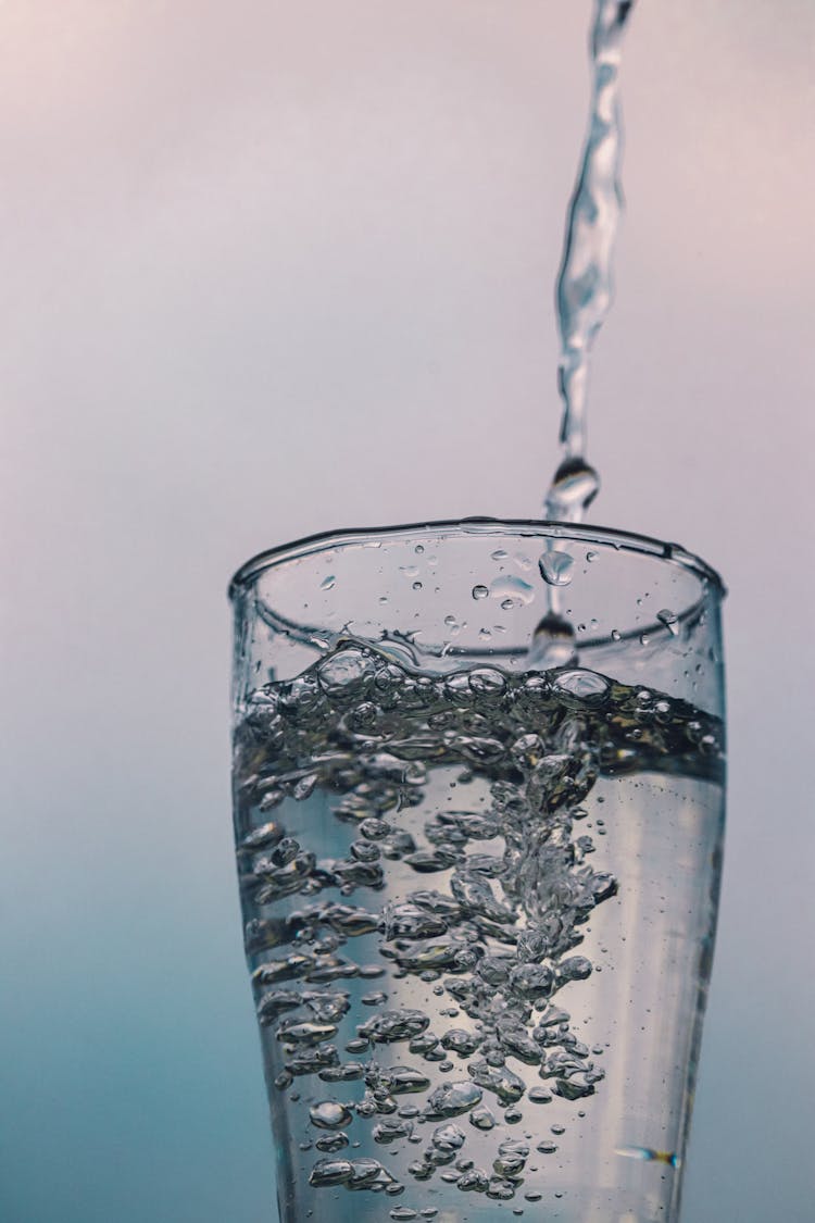 Spring Pure Water In Transparent Glass