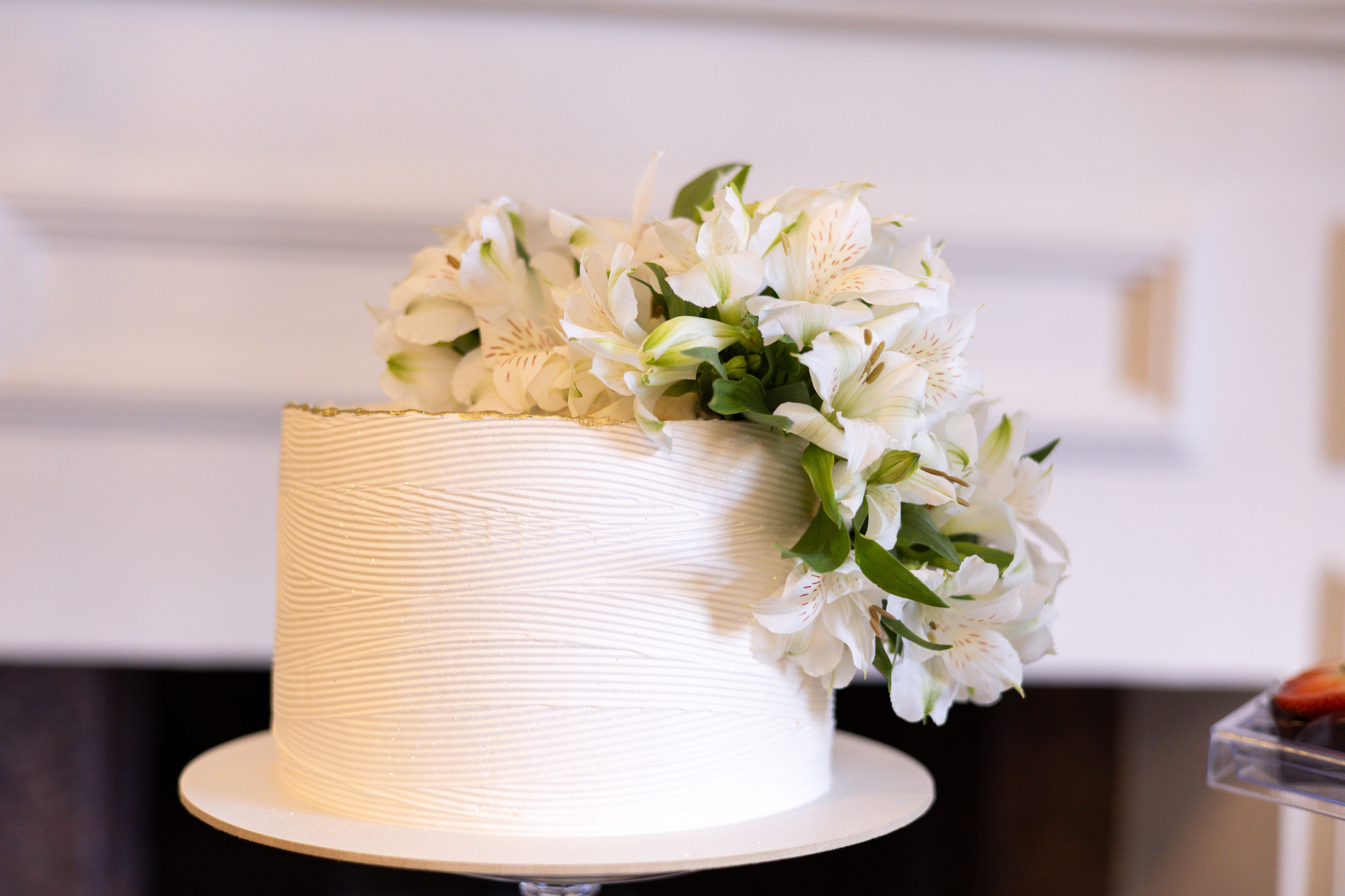 Elegant White Cake with Floral Decoration · Free Stock Photo