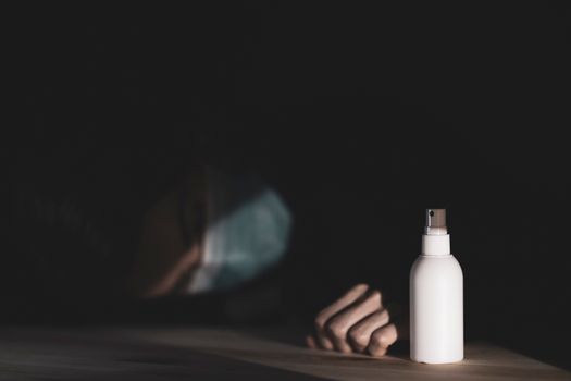Person Near White Plastic Spray Bottle
