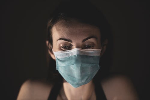 Free Woman With Green Face Mask Stock Photo