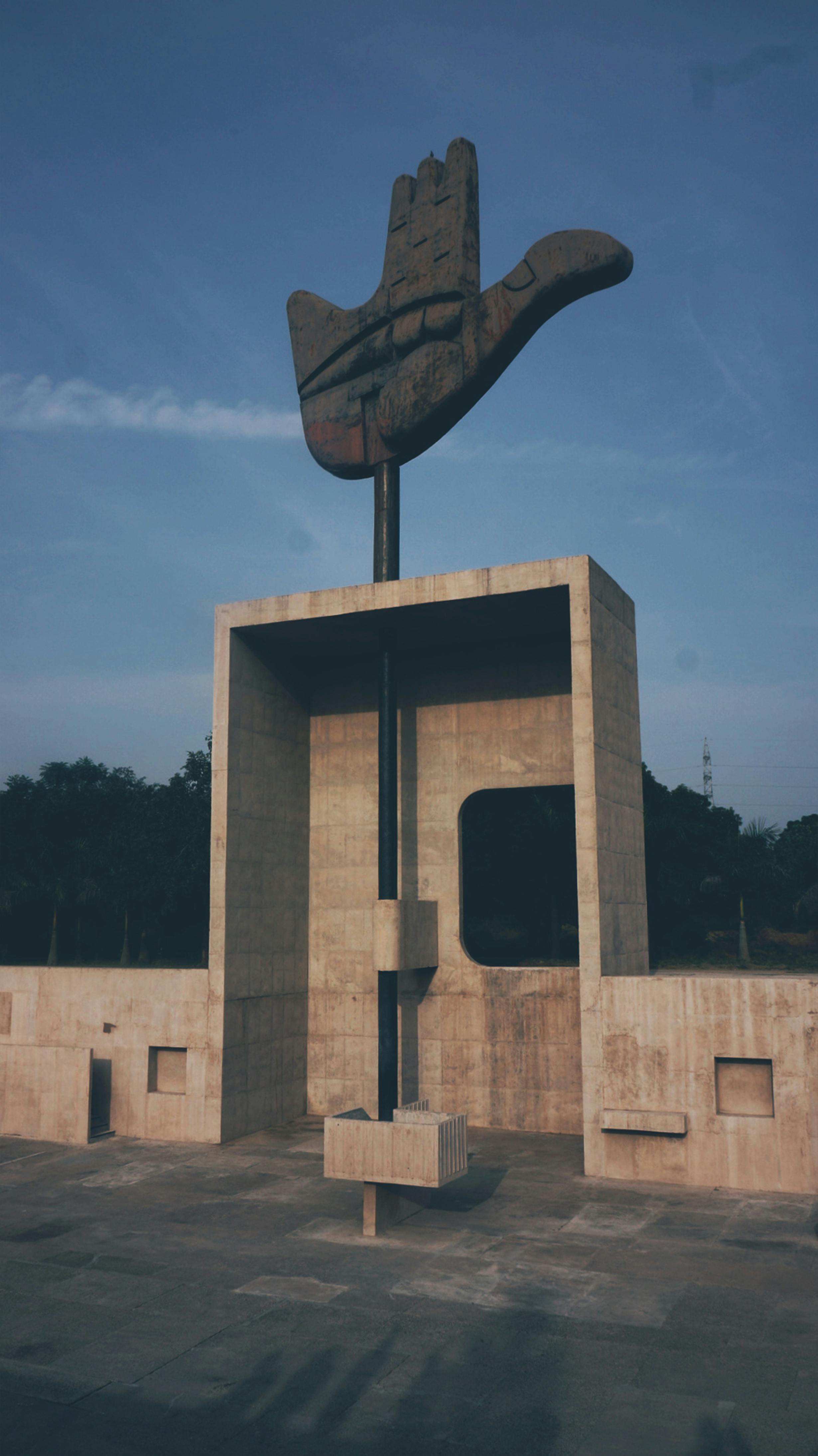 Open Hand Monument Under Blue Sky · Free Stock Photo