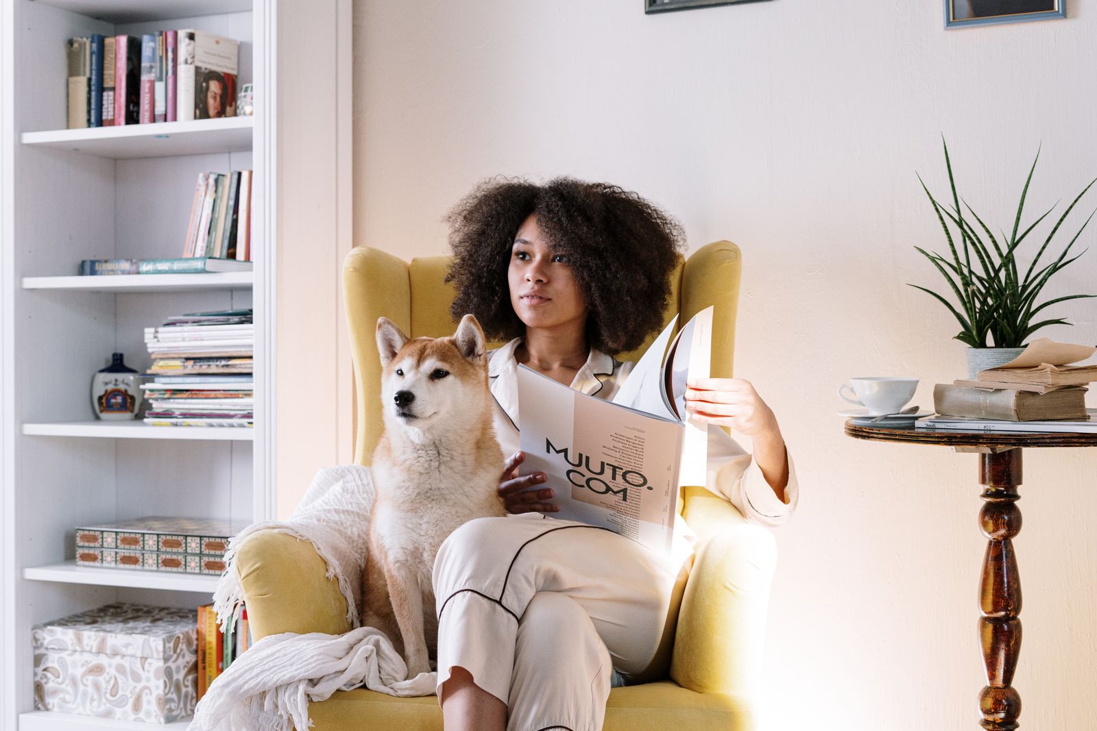 Pet owner at home with a dog