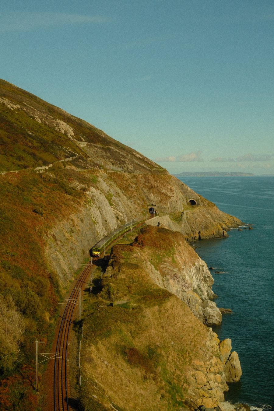 A train running along the Irish coast