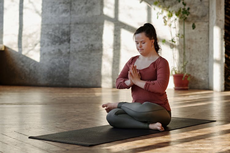 Photo Of Woman Meditating Alone