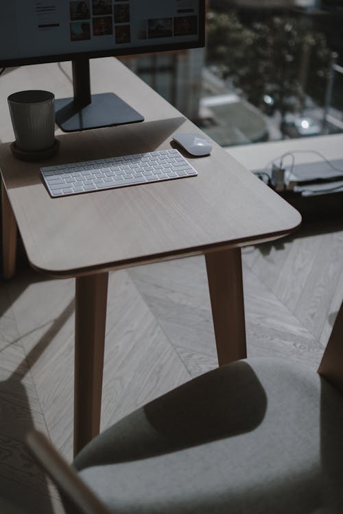 Black Mug on Brown Wooden Table