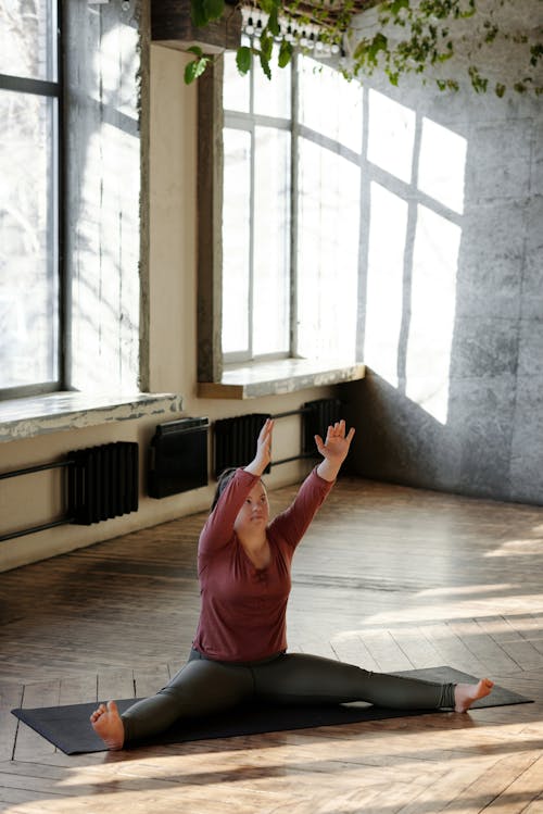 Photo Of Woman Raising Her Hands