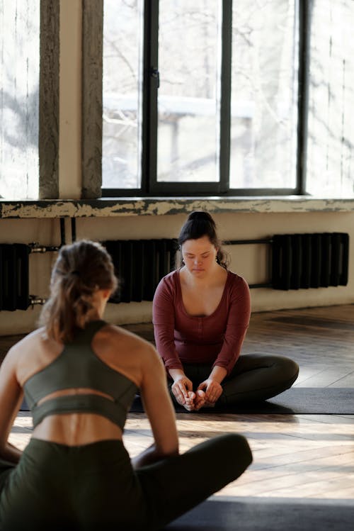 Photo Of Women Meditating Together