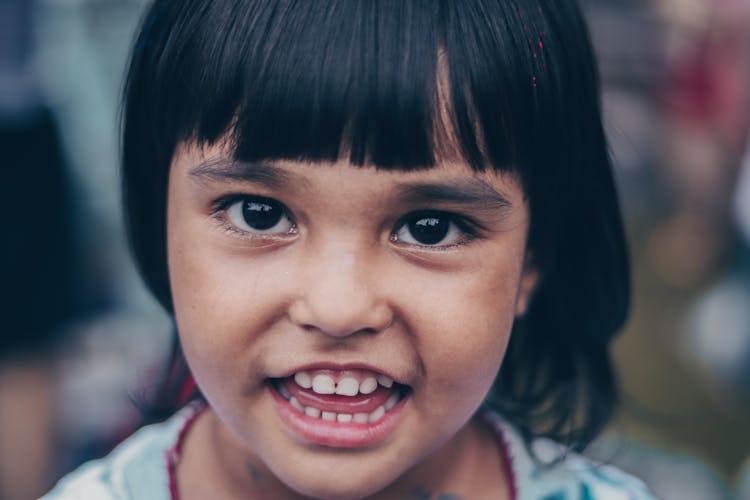  Portrait Of A Girl With A Smiling Face