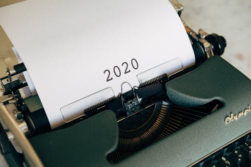 Free White Printer Paper on Black Typewriter Stock Photo