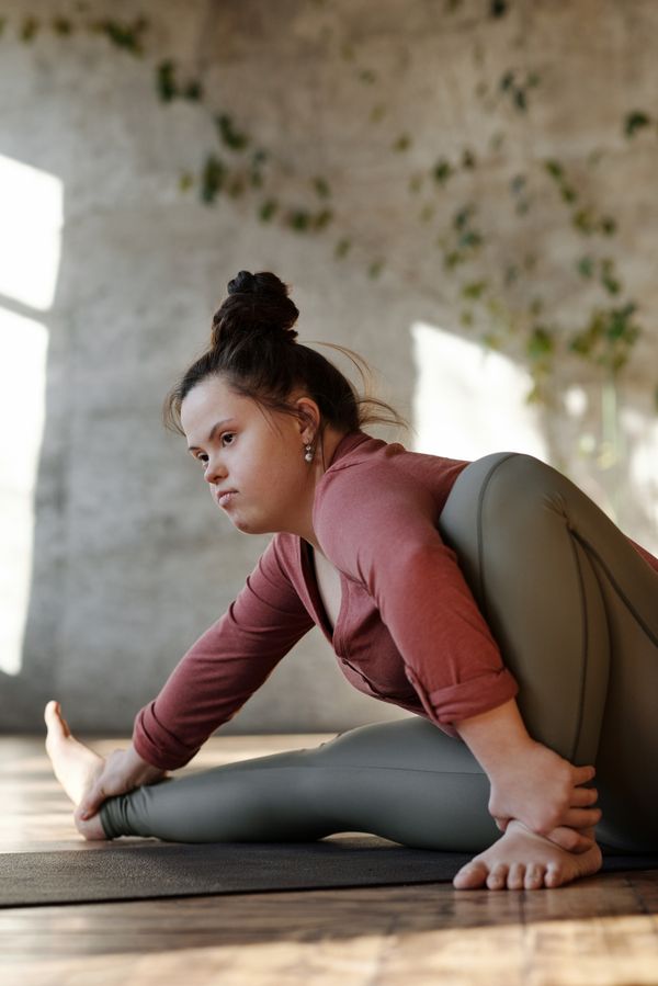 Yoga mat used during a home stretching session