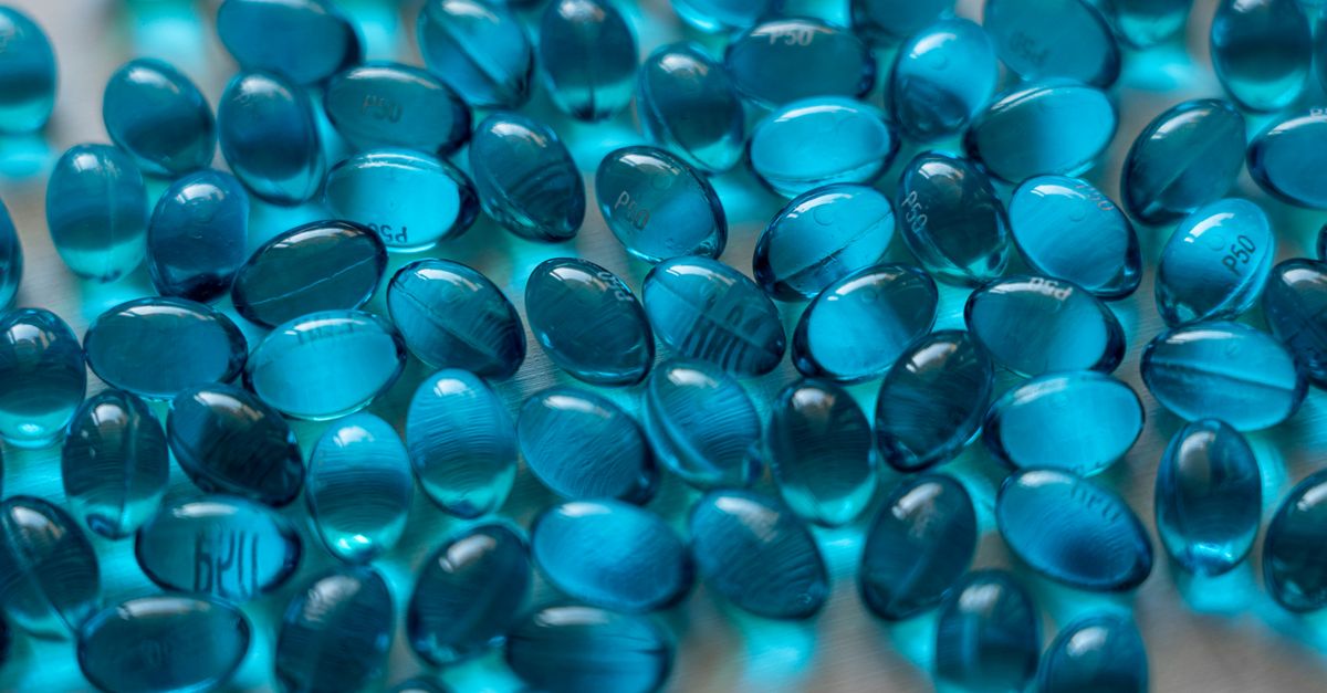 Detailed close-up of vibrant blue gel capsules symbolizing medical and healthcare treatments. - Evidence evidence guide for lutein supplementation visual fatigue randomized trial