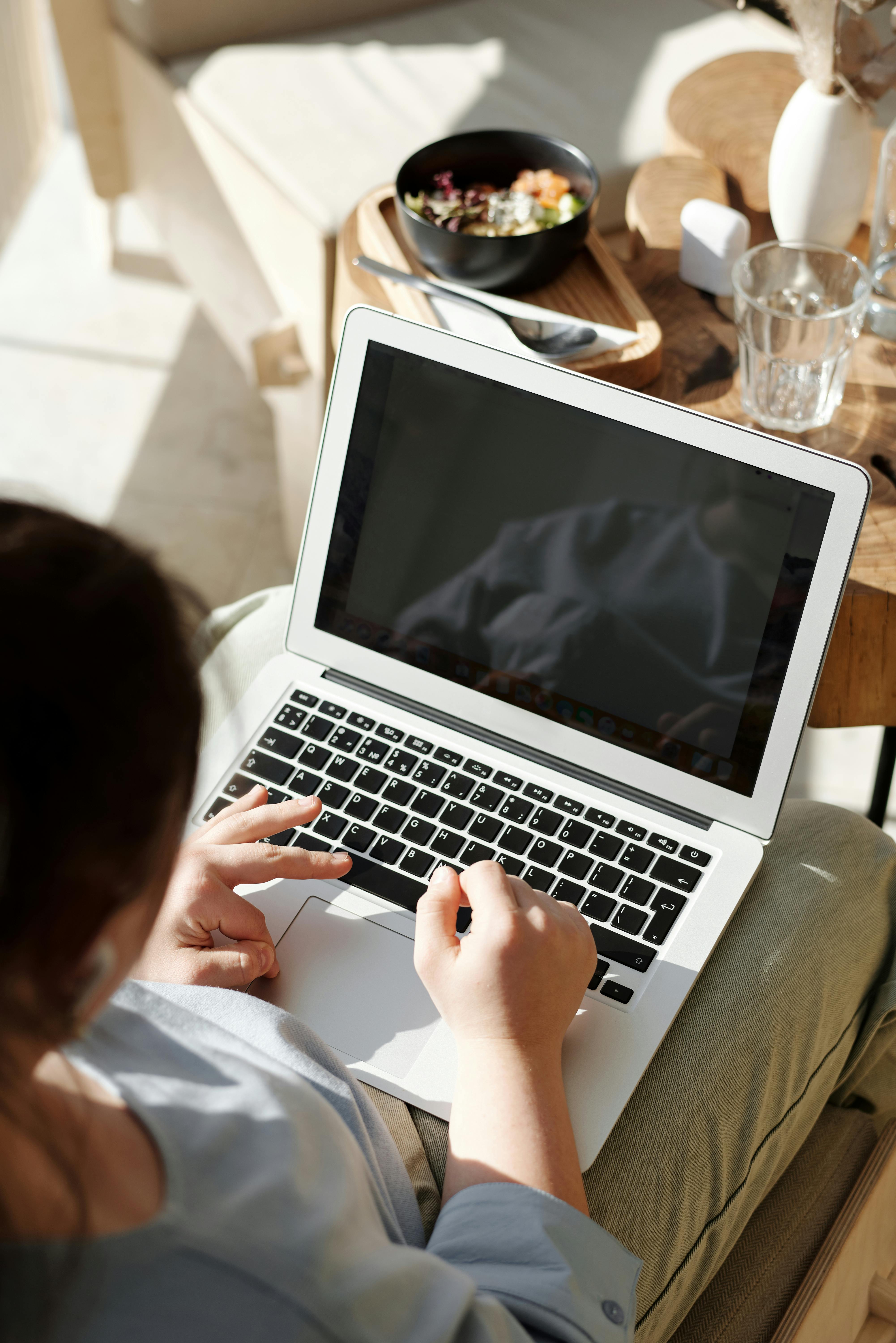 young girl using a laptop