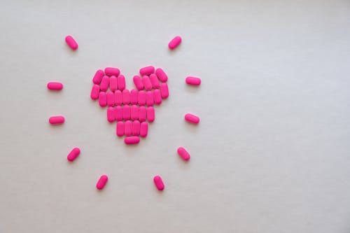 Pink Medicines In Heart Shape