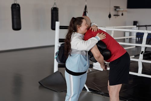 Základová fotografie zdarma na téma boxovací ring, boxovací rukavice, downův syndrom