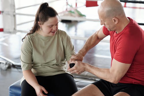 Man Holding Woman's Hand