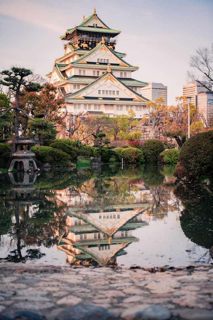 Osaka Castle Near Green Trees And Body Of Water