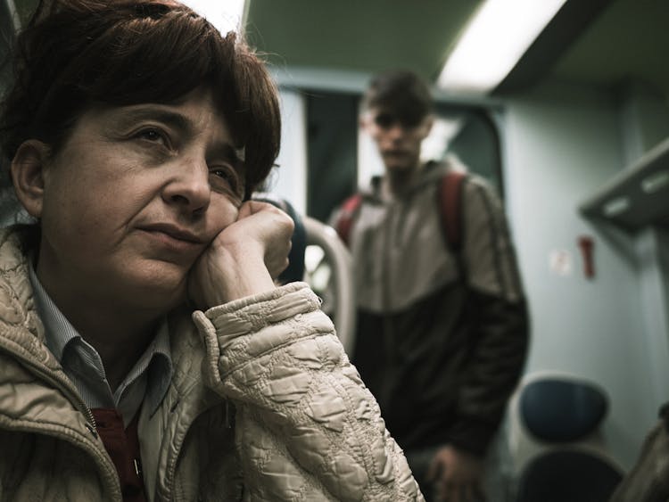 Bored Woman Riding Underground Train