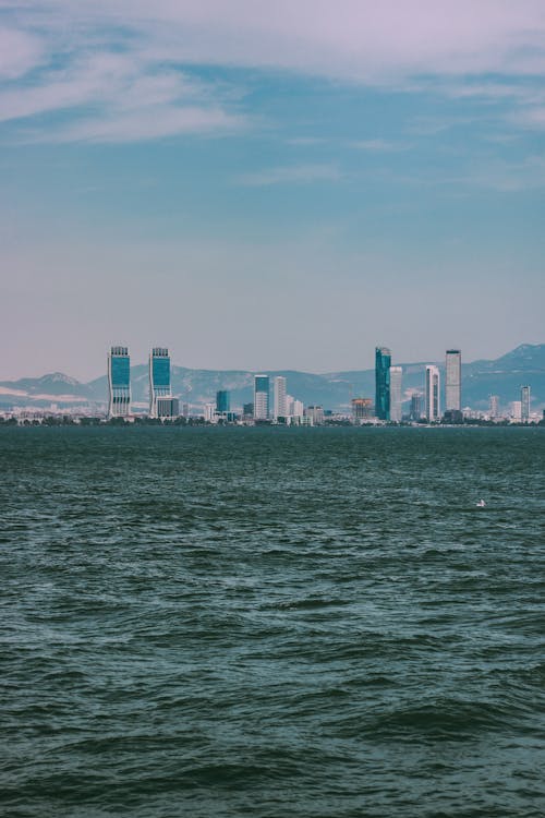 City Skyline Across Body of Water