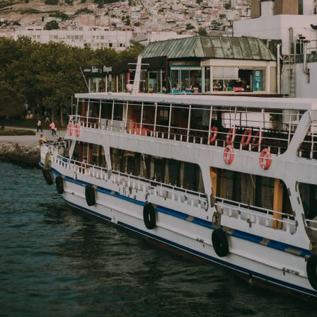 Ferry docked in a harbour at dusk — photo by Furkan Films on Pexels