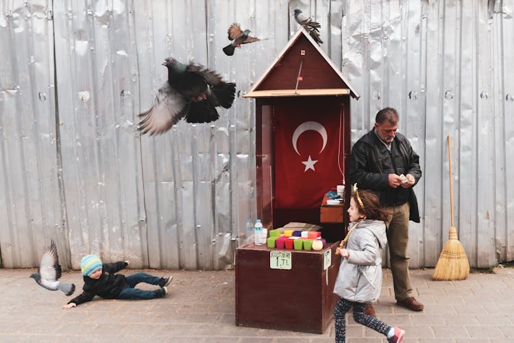 Kids Playing With Birds