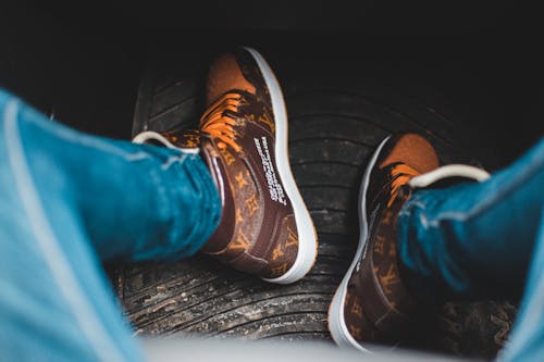 Free Person Wearing Brown Shoes Stock Photo