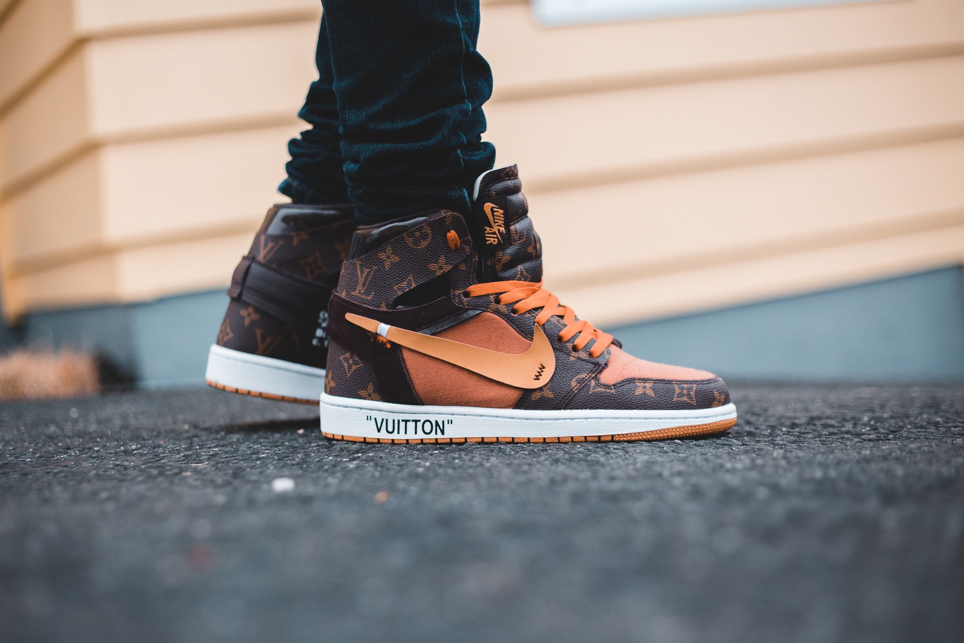Person Wearing Brown Nike High Top Sneakers