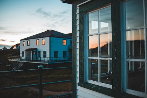 Exterior of cozy house in evening